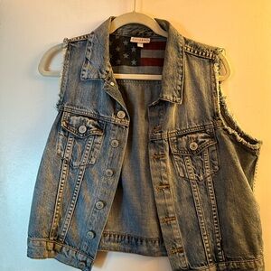 Shyanne cropped, denim vest with frayed sleeve openings